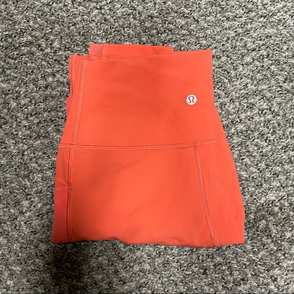 Lululemon athletica tangerine leggings size 6.